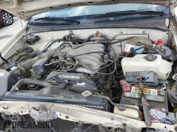 1995 Toyota T100 DX with VIN JT4VD12E2S0009844, listed as a Copart auction lot 51738525 with 357,475 mi miles and Salvage Title. Bid and sale history available at carsss.com. Image 11.