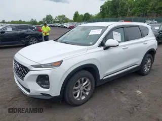 2019 Hyundai Santa Fe SE z VIN 5NMS2CADXKH005960, wystawiony jako IAAI lot #42341142 z przebiegiem 71 617 mil mil oraz . Historia ofert i sprzedaży dostępna na DreamBid. Obrazek 17.