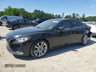 2014 Mazda 6 i Touring with VIN JM1GJ1V67E1160022, listed as a Copart auction lot 57207635 with 142,056 mi miles and Clean title. Bid and sale history available at DreamBid. Image 1.