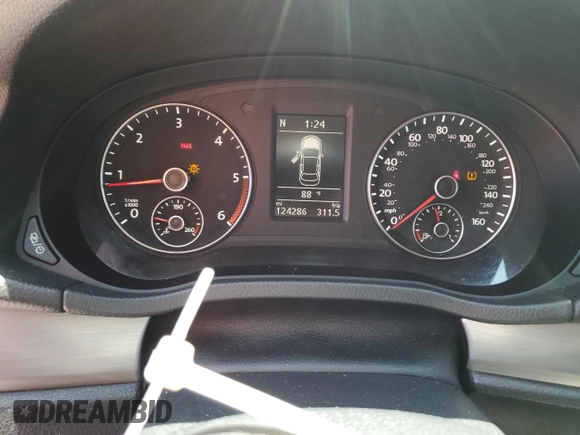 2015 Volkswagen Passat SE with VIN 1VWBV7A30FC065687, listed as a Copart auction lot 63218375 with 124,286 mi miles and Salvage title. Bid and sale history available at DreamBid. Image 9.