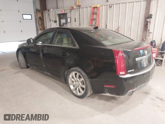 2009 Cadillac CTS AWD w/1SB with VIN 1G6DT57V290152885, listed as a IAAI auction lot 42063192 with 146,119 mi miles. Bid and sale history available at carsss.com. Image 3.