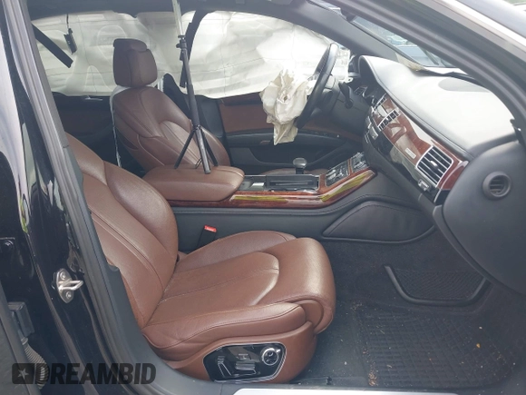2012 Audi A8 with VIN WAURVAFDXCN017546, listed as a IAAI auction lot 39830968 with 123,089 mi miles and . Bid and sale history available at DreamBid. Image 5.