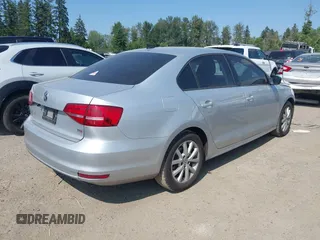 2015 Volkswagen Jetta Sport with VIN 3VWD17AJ0FM271660, listed as a IAAI auction lot 42527496 with 115,008 mi miles and . Bid and sale history available at DreamBid. Image 4.