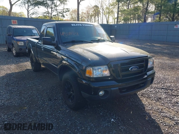 2011 Ford Ranger XLT with VIN 1FTLR4FE9BPB07796, listed as a IAAI auction lot 42128597 with 235,512 mi miles. Bid and sale history available at carsss.com. Image 1.