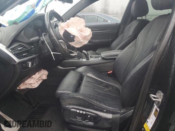 2016 BMW X6 xDrive35i z VIN 5UXKU2C56G0N80105, wystawiony jako Copart lot #46983345 z przebiegiem 99 913 mil mil oraz Szkoda całkowita • Salvage title. Historia ofert i sprzedaży dostępna na DreamBid. Obrazek 7.