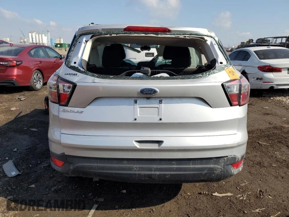 2017 Ford Escape S с VIN 1FMCU0F79HUB86529, выставлен на аукционе Copart как лот 52155845 с пробегом Не указан миль и Списание • Salvage title. История ставок и продаж доступна на DreamBid. Изображение 6.