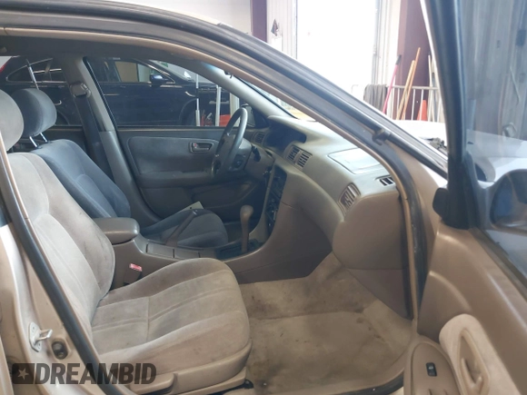 1999 Toyota Camry LE с VIN JT2BG22K7X0351800, выставлен на аукционе IAAI как лот 42216413 с пробегом 216 330 миль миль и . История ставок и продаж доступна на DreamBid. Изображение 5.