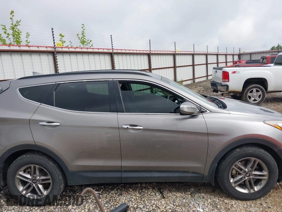 2018 Hyundai Santa Fe 2.4L with VIN 5NMZU3LB1JH100507, listed as a IAAI auction lot 42182116 with 103,826 mi miles and . Bid and sale history available at DreamBid. Image 13.