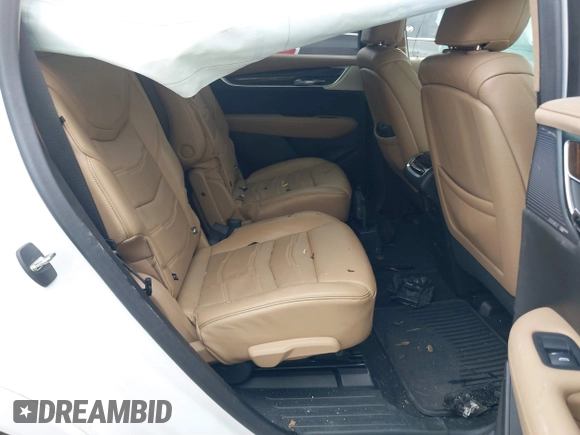 2021 Cadillac XT6 Premium Luxury with VIN 1GYKPFRS0MZ100879, listed as a IAAI auction lot 41083030 with 56,502 mi miles and . Bid and sale history available at DreamBid. Image 8.