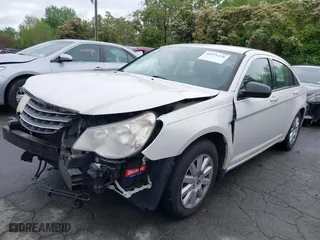 2010 Chrysler Sebring Touring with VIN 1C3CC4FB5AN229593, listed as a IAAI auction lot 41971326 with 144,561 mi miles. Bid and sale history available at carsss.com. Image 17.