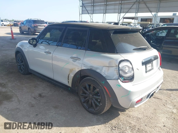 2015 MINI Hardtop 4 Door S z VIN WMWXU3C55F2B66314, wystawiony jako IAAI lot #42211312 z przebiegiem 101 395 mil mil oraz . Historia ofert i sprzedaży dostępna na DreamBid. Obrazek 3.