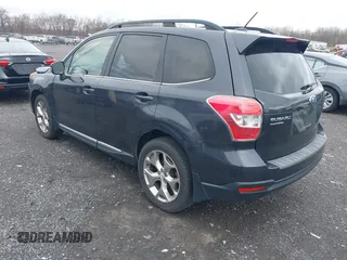 2015 Subaru Forester Touring with VIN JF2SJAWC0FH585722, listed as a IAAI auction lot 41734016 with 90,728 mi miles and . Bid and sale history available at DreamBid. Image 3.