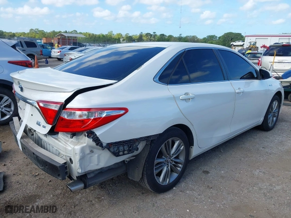 2015 Toyota Camry Hybrid LE with VIN 4T1BD1FK7FU142175, listed as a IAAI auction lot 41958486 with 120,013 mi miles. Bid and sale history available at carsss.com. Image 4.