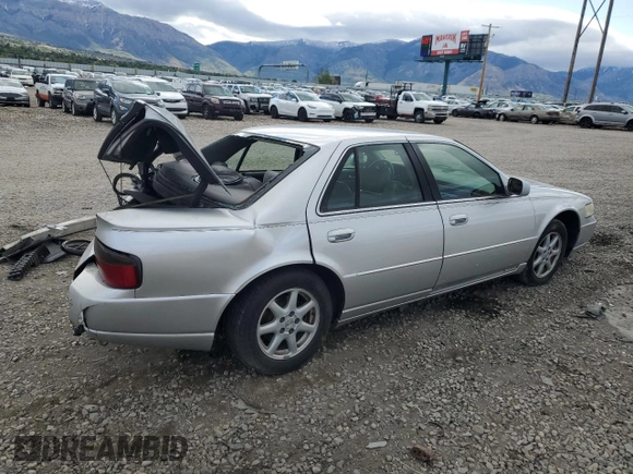 2003 Cadillac Seville Luxury SLS z VIN 1G6KS54Y53U262581, wystawiony jako Copart lot #55597595 z przebiegiem 80 832 mil mil oraz Szkoda całkowita • Salvage title. Historia ofert i sprzedaży dostępna na DreamBid. Obrazek 3.