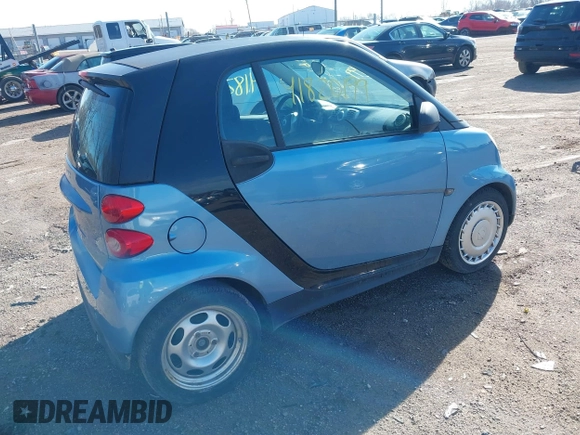 2013 Smart fortwo Pure z VIN WMEEJ3BA5DK672416, wystawiony jako IAAI lot #41820199 z przebiegiem 75 875 mil mil oraz . Historia ofert i sprzedaży dostępna na DreamBid. Obrazek 4.