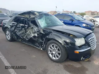 2008 Chrysler 300 C Hemi with VIN 2C3KA63H18H335466, listed as a IAAI auction lot 41899381 with Not Provided miles and . Bid and sale history available at carsss.com. Image 1.