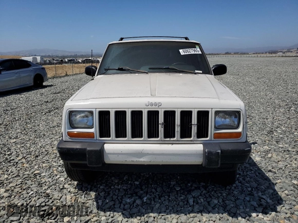 2000 Jeep Cherokee with VIN 1J4FT48S6YL152495, listed as a Copart auction lot 60627965 with 196,086 mi miles and Salvage title. Bid and sale history available at DreamBid. Image 5.