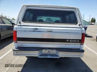 1992 Ford F-150 with VIN 1FTDF15Y7NLA93044, listed as a Copart auction lot 65185644 with 166,919 mi miles and Clean Title. Bid and sale history available at carsss.com. Image 6.