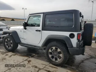 2018 Jeep Wrangler Sport S with VIN 1C4AJWAG1JL884708, listed as a Copart auction lot 82643804 with 80,002 mi miles and Salvage title. Bid and sale history available at DreamBid. Image 2.