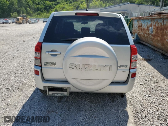 2011 Suzuki Grand Vitara Premium z VIN JS3TD0D29B4103041, wystawiony jako Copart lot #62066985 z przebiegiem 219 727 mil mil oraz Szkoda całkowita • Salvage title. Historia ofert i sprzedaży dostępna na DreamBid. Obrazek 6.