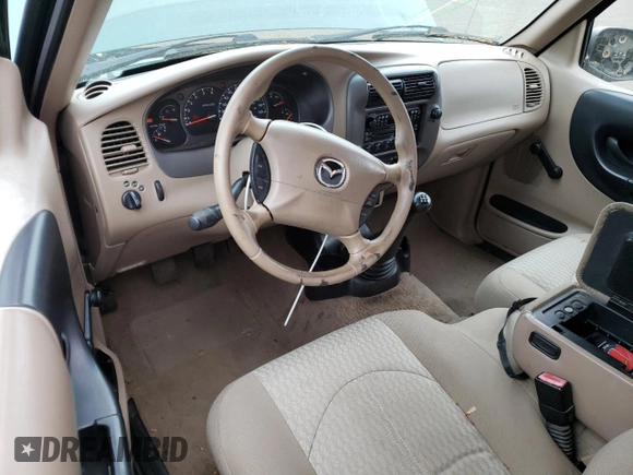 2001 Mazda B-Series Truck DS z VIN 4F4YR16U31TM01851, wystawiony jako Copart lot #57491815 z przebiegiem 113 145 mil mil oraz Szkoda całkowita • Salvage title. Historia ofert i sprzedaży dostępna na DreamBid. Obrazek 8.
