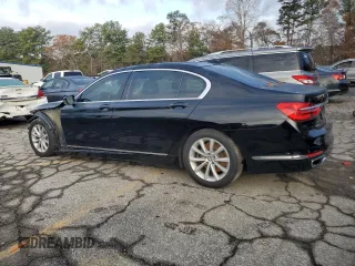2018 BMW 7 Series 740i with VIN WBA7E2C58JG743269, listed as a Copart auction lot 84905044 with 74,951 mi miles and Salvage Title. Bid and sale history available at carsss.com. Image 2.