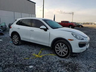 2013 Porsche Cayenne S с VIN WP1AB2A28DLA85229, выставлен на аукционе Copart как лот 50935415 с пробегом 215 629 миль миль и Списание • Salvage title. История ставок и продаж доступна на DreamBid. Изображение 4.