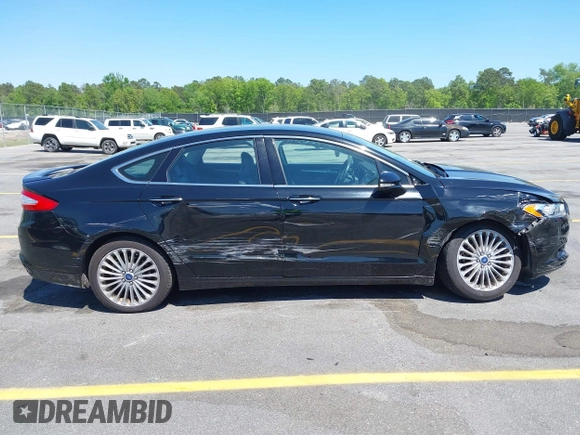 2016 Ford Fusion Titanium with VIN 3FA6P0K9XGR158234, listed as a IAAI auction lot 42043716 with 161,164 mi miles. Bid and sale history available at carsss.com. Image 13.