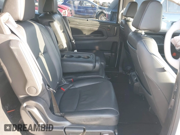 2022 Honda Odyssey Touring with VIN 5FNRL6H85NB058948, listed as a IAAI auction lot 42579157 with 53,669 mi miles and . Bid and sale history available at DreamBid. Image 8.