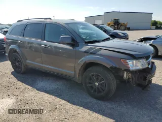 2013 Dodge Journey SXT with VIN 3C4PDCBGXDT630423, listed as a Copart auction lot 62359685 with 151,653 mi miles and Salvage title. Bid and sale history available at DreamBid. Image 4.