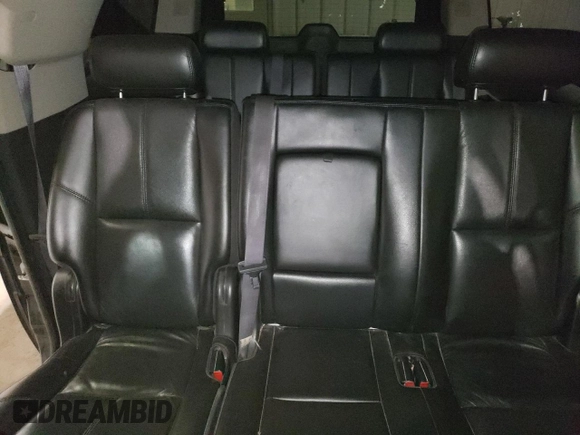 2013 Chevrolet Suburban with VIN 1GNWK5EG4DR246825, listed as a Copart auction lot 56764205 with 162,459 mi miles and Salvage title. Bid and sale history available at DreamBid. Image 10.