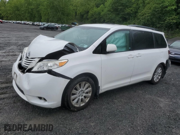 2015 Toyota Sienna LE with VIN 5TDJK3DCXFS126604, listed as a Copart auction lot 56987355 with 102,079 mi miles and Salvage title. Bid and sale history available at DreamBid. Image 1.