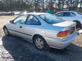1997 Honda Civic DX with VIN 1HGEJ6223VL095214, listed as a IAAI auction lot 41560717 with 257,409 mi miles. Bid and sale history available at carsss.com. Image 3.