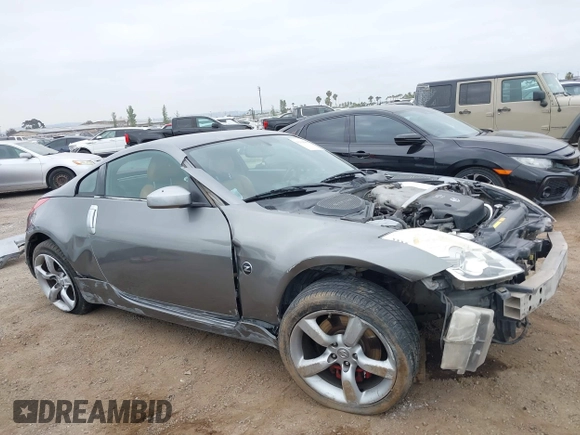 2006 Nissan 350Z Touring z VIN JN1AZ34D86M312841, wystawiony jako IAAI lot #42336869 z przebiegiem 138 191 mil mil oraz . Historia ofert i sprzedaży dostępna na DreamBid. Obrazek 6.