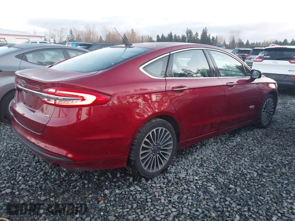 2017 Ford Fusion Energi SE with VIN 3FA6P0PU3HR277659, listed as a IAAI auction lot 41297011 with 119,244 mi miles. Bid and sale history available at carsss.com. Image 4.