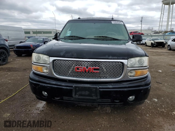 2003 GMC Yukon Denali z VIN 1GKEK63U43J263449, wystawiony jako Copart lot #53848345 z przebiegiem 144 280 mil mil oraz Szkody całkowita. Historia ofert i sprzedaży dostępna na DreamBid. Obrazek 5.