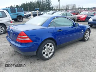 2000 Mercedes-Benz SLK 230 Kompressor with VIN WDBKK47F4YF147997, listed as a IAAI auction lot 41893379 with 72,492 mi miles and . Bid and sale history available at DreamBid. Image 4.
