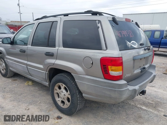 1999 Jeep Grand Cherokee Laredo с VIN 1J4GW58N4XC676836, выставлен на аукционе IAAI как лот 41799381 с пробегом 203 784 миль миль и . История ставок и продаж доступна на DreamBid. Изображение 3.