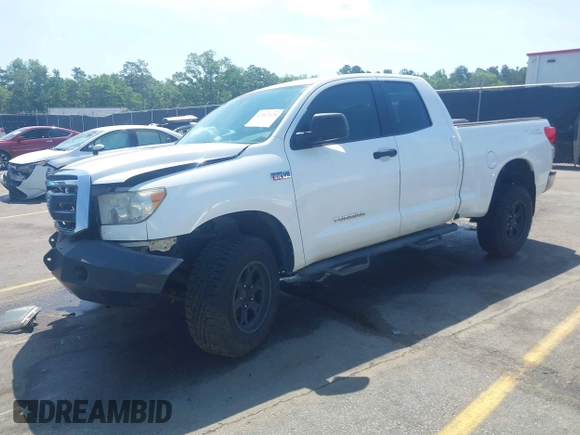 2012 Toyota Tundra z VIN 5TFUW5F10CX265543, wystawiony jako IAAI lot #42162418 z przebiegiem 219 270 mil mil oraz . Historia ofert i sprzedaży dostępna na DreamBid. Obrazek 17.