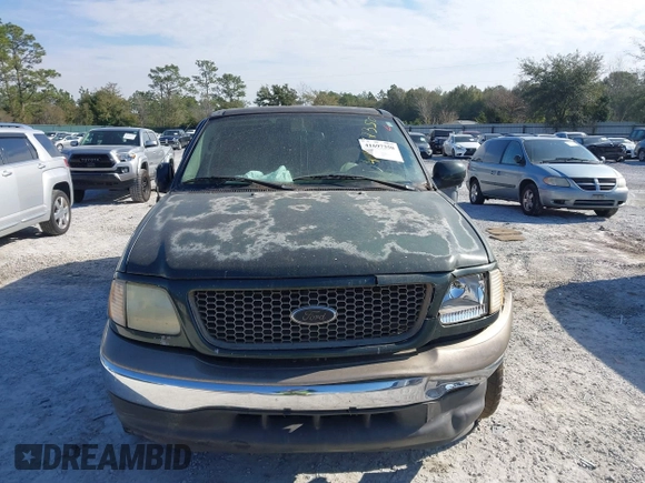 2003 Ford F-150 XLT with VIN 1FTRW07L53KA64064, listed as a IAAI auction lot 41697350 with 227,114 mi miles. Bid and sale history available at carsss.com. Image 12.