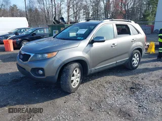 2012 Kia Sorento LX with VIN 5XYKT4A60CG215645, listed as a IAAI auction lot 42026665 with 121,901 mi miles. Bid and sale history available at carsss.com. Image 2.