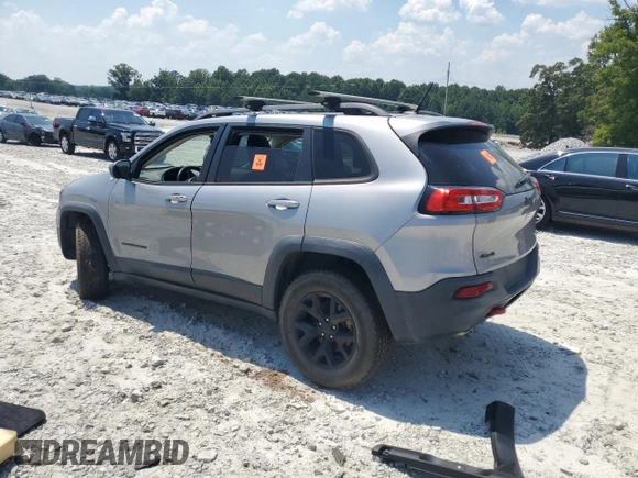2015 Jeep Cherokee Trailhawk with VIN 1C4PJMBS3FW735398, listed as a Copart auction lot 63700015 with 157,123 mi miles and Clean title. Bid and sale history available at DreamBid. Image 2.