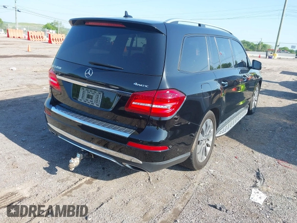2018 Mercedes-Benz GLS 450 with VIN 4JGDF6EE1JB075332, listed as a IAAI auction lot 42120007 with 111,559 mi miles and . Bid and sale history available at DreamBid. Image 4.