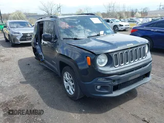 2015 Jeep Renegade Latitude with VIN ZACCJBBT0FPB73676, listed as a IAAI auction lot 42032879 with 121,953 mi miles. Bid and sale history available at carsss.com. Image 1.