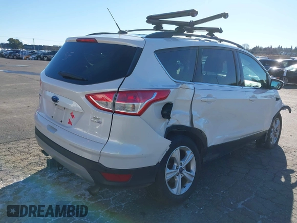 2016 Ford Escape SE with VIN 1FMCU9GX2GUB29249, listed as a IAAI auction lot 41545211 with 97,631 mi miles. Bid and sale history available at carsss.com. Image 4.