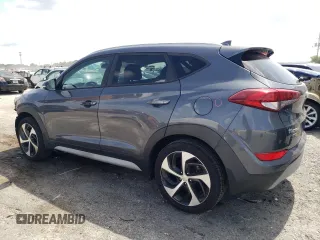 2018 Hyundai Tucson Sport z VIN KM8J33ALXJU764322, wystawiony jako Copart lot #59739985 z przebiegiem 79 882 mil mil oraz Szkoda całkowita • Salvage title. Historia ofert i sprzedaży dostępna na DreamBid. Obrazek 2.