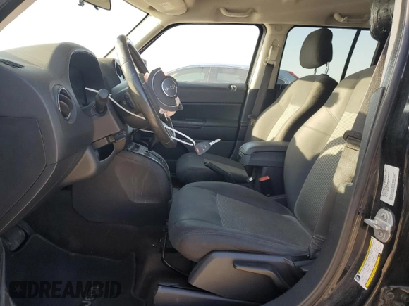 2015 Jeep Patriot Latitude with VIN 1C4NJPFB4FD298011, listed as a Copart auction lot 52152845 with 95,101 mi miles and Salvage Title. Bid and sale history available at DreamBid. Image 7.