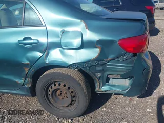 2009 Toyota Corolla with VIN 1NXBU40E39Z018168, listed as a IAAI auction lot 42661070 with 249,008 mi miles and . Bid and sale history available at DreamBid. Image 6.