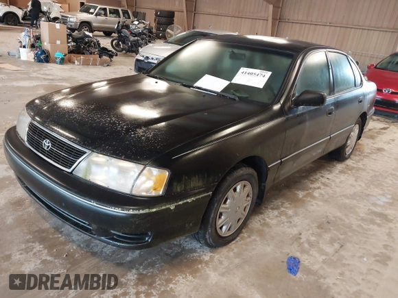 1998 Toyota Avalon XL with VIN 4T1BF18B7WU246141, listed as a IAAI auction lot 41405474 with 266,384 mi miles and . Bid and sale history available at DreamBid. Image 2.