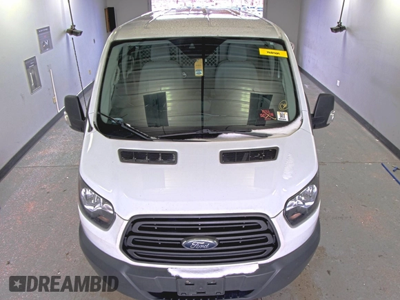 2018 Ford Transit z VIN 1FTYR1YG6JKA87506, wystawiony jako IAAI lot #42501070 z przebiegiem 167 892 mil mil oraz . Historia ofert i sprzedaży dostępna na DreamBid. Obrazek 13.